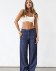 Striped woven wide leg pants. Hook and eye and zipper fly. Side pockets. Unlined. Business casual work pants. Slacks. Blue pants. blue slacks. blue stripe work pants.