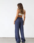 Striped woven wide leg pants. Hook and eye and zipper fly. Side pockets. Unlined. Business casual work pants. Slacks. Blue pants. blue slacks. blue stripe work pants.