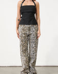 Printed jeans. Button and zipper fly. Five pocket construction. Unlined. cheetah pants. cheetah jeans. leopard jeans. leopard pants