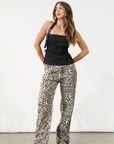 Printed jeans. Button and zipper fly. Five pocket construction. Unlined. cheetah pants. cheetah jeans. leopard jeans. leopard pants