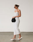 Striped ribbed knit maxi dress. Strapless elastic neckline. Front knot detail. Unlined.