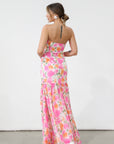 Floral printed crinkle chiffon maxi dress. Elastic neckline. Inner rubber grip lining. Side hook and eye and zipper closures. Partially lined. Guest wedding dress. Floral maxi dress. Floral guest wedding dress. Spring dress. Spring wedding dress. Spring guest wedding dress. Sleeveless guest wedding dress.