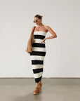 Striped knit maxi dress. Strapless elastic neckline. Fully lined. Stretchy, black and ivory, horizontal stripe maxi dress