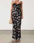 Floral printed satin maxi dress. Adjustable straps. Lace trim. Underwire cups. Side zipper closure. Back clasp closure. Unlined.