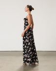 Floral printed satin maxi dress. Adjustable straps. Lace trim. Underwire cups. Side zipper closure. Back clasp closure. Unlined.