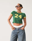 Knit crop tee. Short sleeves. Unlined. Green with yellow trim. Varsity number 24.