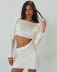 Satin dress. Long sleeves. Side cut out. Side zipper closure. Unlined. off white satin dress. off white mini dress. dress with cut out. cream satin mini dress. bride. bridal dress. engagement dress. bridal shower dress. wedding after party dress