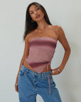 Tie dye knit mesh tube top. Elastic neckline. Side drawstring closure. Asymmetric hem. Partially lined. summer top. summer tube top. pink tube top. mesh tube top. going out top.