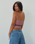 Tie dye knit mesh tube top. Elastic neckline. Side drawstring closure. Asymmetric hem. Partially lined. summer top. summer tube top. pink tube top. mesh tube top. going out top.