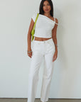Knit crop top. Asymmetric sleeves. Unlined. white top. summer top. going out top. twist strap. white crop top