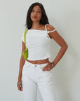 Knit crop top. Asymmetric sleeves. Unlined. white top. summer top. going out top. twist strap. white crop top