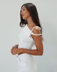 Knit crop top. Asymmetric sleeves. Unlined. white top. summer top. going out top. twist strap. white crop top
