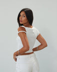 Knit crop top. Asymmetric sleeves. Unlined. white top. summer top. going out top. twist strap. white crop top