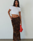 Animal printed chiffon maxi skirt. Side hook and eye and zipper closures. Fully lined. leopard maxi skirt. going out skirt. going out outfit. date night outfit. date night skirt. vacation outfit.