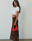 Animal printed chiffon maxi skirt. Side hook and eye and zipper closures. Fully lined. leopard maxi skirt. going out skirt. going out outfit. date night outfit. date night skirt. vacation outfit.