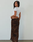 Animal printed chiffon maxi skirt. Side hook and eye and zipper closures. Fully lined. leopard maxi skirt. going out skirt. going out outfit. date night outfit. date night skirt. vacation outfit.