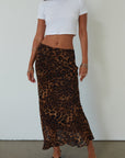 Animal printed chiffon maxi skirt. Side hook and eye and zipper closures. Fully lined. leopard maxi skirt. going out skirt. going out outfit. date night outfit. date night skirt. vacation outfit.