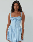 Satin dress with lace trim. Adjustable straps. Front tie closure. Underwire cups. Boning in bodice. Back lace up closure. Elastic back waist. Fully lined. blue satin mini dress. summer dress. fancy mini dress.