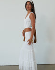 Lace sleeveless top. Boning in bodice. Front hook and eye closures. Fully lined. Knit lace maxi skirt. Elastic waistband. Fully lined. maxi skirt set. lace set. lace maxi skirt set. bridal shower set. bridal shower outfit. vacation set. vacation outfit. summer outfit. summer set