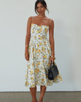 Floral printed woven midi dress. Adjustable straps. Underwire cups. Side pockets. Back hook and eye and zipper closures. Fully lined. floral midi dress. summer dress. summer midi dress.