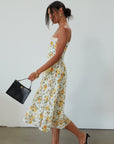 Floral printed woven midi dress. Adjustable straps. Underwire cups. Side pockets. Back hook and eye and zipper closures. Fully lined. floral midi dress. summer dress. summer midi dress.