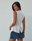 Woven vest. Front button down closure. Back slit. Fully lined. white vest top. summer top. going out top. dressy casual top. cute casual business top. going out top. work from home top. nice dinner top
