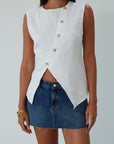 Woven vest. Front button down closure. Back slit. Fully lined. white vest top. summer top. going out top. dressy casual top. cute casual business top. going out top. work from home top. nice dinner top