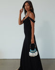 Chiffon maxi dress. Adjustable crisscross back straps. Side zipper closure. Fully lined. black maxi dress. wedding guest dress