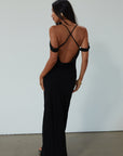 Chiffon maxi dress. Adjustable crisscross back straps. Side zipper closure. Fully lined. black maxi dress. wedding guest dress