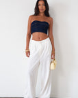 Denim tube top. Strapless neckline. Inner rubber grip lining. Back hook and eye and zipper closures. Fully lined. summer top. going out top