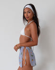 Printed woven mesh skirt. Beaded adjustable side tie closure. Unlined/sheer. skirt cover up. mexico skirt coverup. beach vacation skirt