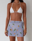 Printed woven mesh skirt. Beaded adjustable side tie closure. Unlined/sheer. skirt cover up. mexico skirt coverup. beach vacation skirt