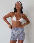 Printed woven mesh skirt. Beaded adjustable side tie closure. Unlined/sheer. skirt cover up. mexico skirt coverup. beach vacation skirt