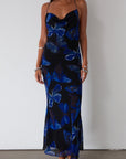 Printed chiffon maxi dress. Adjustable cross cross back straps. Side zipper closure. Fully lined. butterfly dress. blue maxi dress
