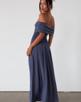Knit maxi dress. Strapless elastic neckline. Off the shoulder short sleeves. Ruched sides. Unlined. Blue maxi dress. blue sleeveless maxi dress. Fold over dress. wedding guest dress. drop waist maxi dress