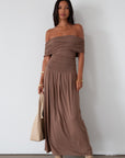 Knit maxi dress. Strapless elastic neckline. Off the shoulder short sleeves. Ruched sides. Unlined. brown maxi dress. brown sleeveless maxi dress. Fold over dress. wedding guest dress. drop waist maxi dress