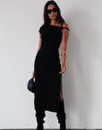 Knit maxi dress. Asymmetric sleeves. Side slit. Unlined. black maxi dress. black midi dress. dress with side slit. wedding guest dress. fancy dinner dress. night out dress