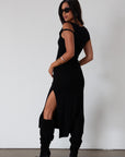 Knit maxi dress. Asymmetric sleeves. Side slit. Unlined. black maxi dress. black midi dress. dress with side slit. wedding guest dress. fancy dinner dress. night out dress