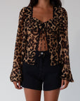 Denim shorts. Button and zipper fly. Five pocket construction. Raw hem. Unlined. black denim shorts