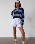 Striped knit crop top. Collar neckline. Long sleeves. Oversized fit. Unlined. polo long sleeve. lounge top. dress down top