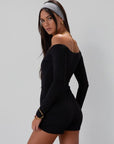 Knit romper. Long sleeves. Surplice neckline. Unlined. black romper. black off the shoulder romper. on the go cute outfit.