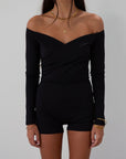 Knit romper. Long sleeves. Surplice neckline. Unlined. black romper. black off the shoulder romper. on the go cute outfit.