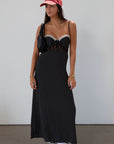 Polka dot printed woven midi dress. Lace details. Adjustable straps. Underwire cups. Back hook and eyes and zipper closures. Unlined.