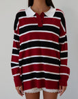 Striped knit top. Collar neckline. Front button closures. Long sleeves. Unlined. striped polo long sleeve. fall transition outfit.