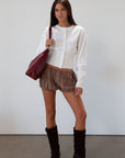 Plaid woven shorts. Elastic waist and leg openings. Unlined. 