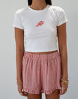 Graphic printed knit crop tee. Crewneck. Short sleeves. Unlined. lobster tee. baby lobster tee. white baby tee