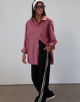 Striped woven pants. Button and zipper fly. Side pockets. Elastic back waist. Unlined.