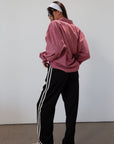 Striped woven pants. Button and zipper fly. Side pockets. Elastic back waist. Unlined.