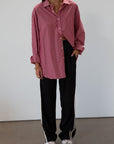 Striped woven pants. Button and zipper fly. Side pockets. Elastic back waist. Unlined.