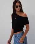 Ribbed knit crop top. Cap sleeves. Banded hem. Unlined. black going out top. cute black top. fall outfit